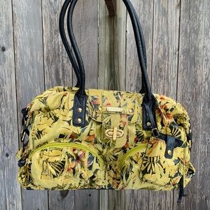 Sharif Asian Inspired Handbag in gold, black, palm patterned with gold hardware